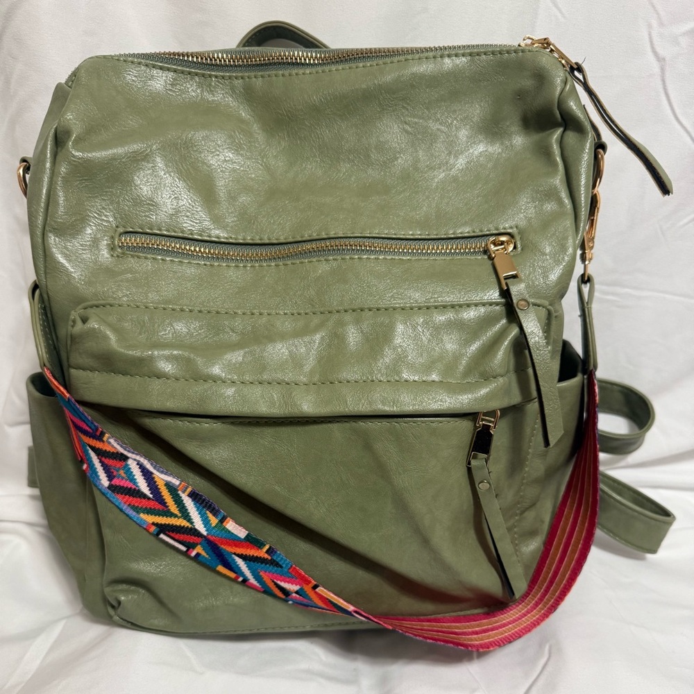 Stylish Green Backpack with Colorful Strap